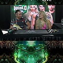 Rhea_Ripley___Tiffany_Stratton_at_WWE_World___Fanatics_Live_mp43336.jpg
