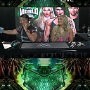 Rhea_Ripley___Tiffany_Stratton_at_WWE_World___Fanatics_Live_mp44226.jpg